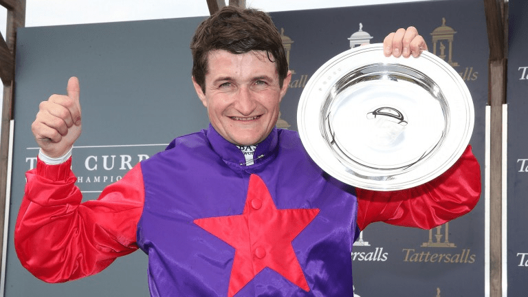 Shane Foley with the Irish Guineas Trophy